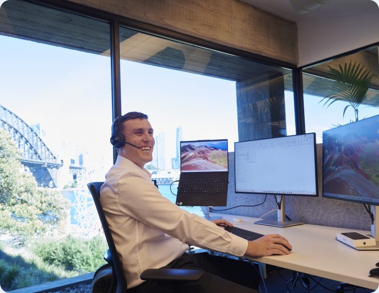 Adviser on the phone at a Sydney desk